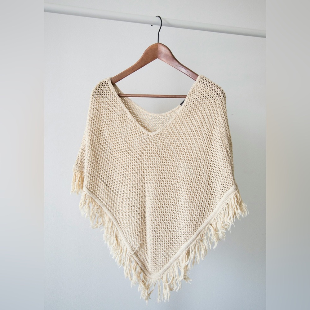 Hand knited shawl. Made with superior fabrics and wool